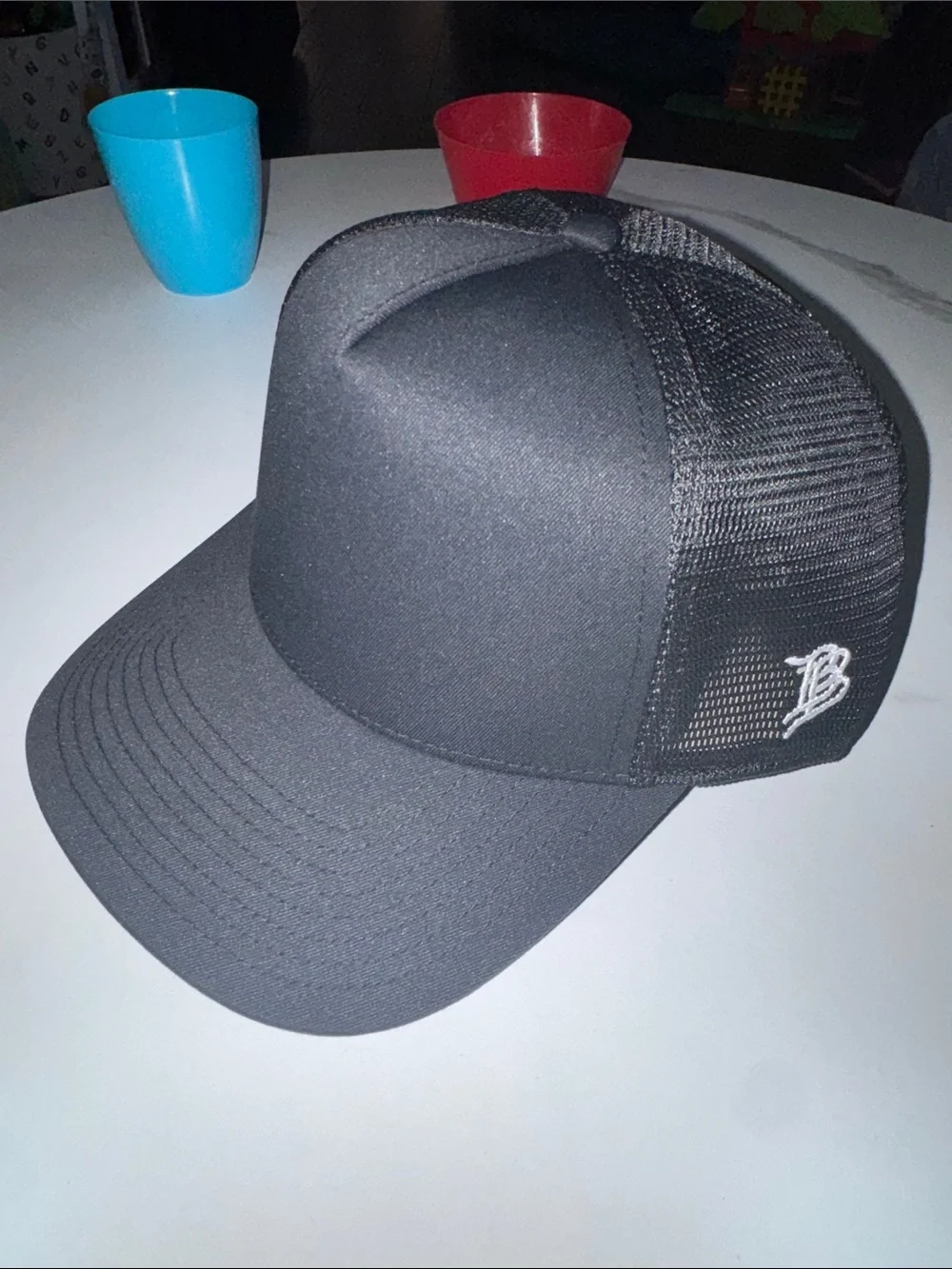 Branded Bills Black Mesh Trucker Cap with White 'B' Logo - Men Grooming